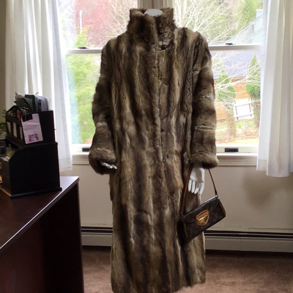 Women’s below the knee length Raccoon fur coat